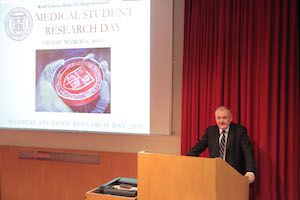 Dr. Anthony Brown, Medical Student Research Day faculty adviser, gives his opening address to students and faculty